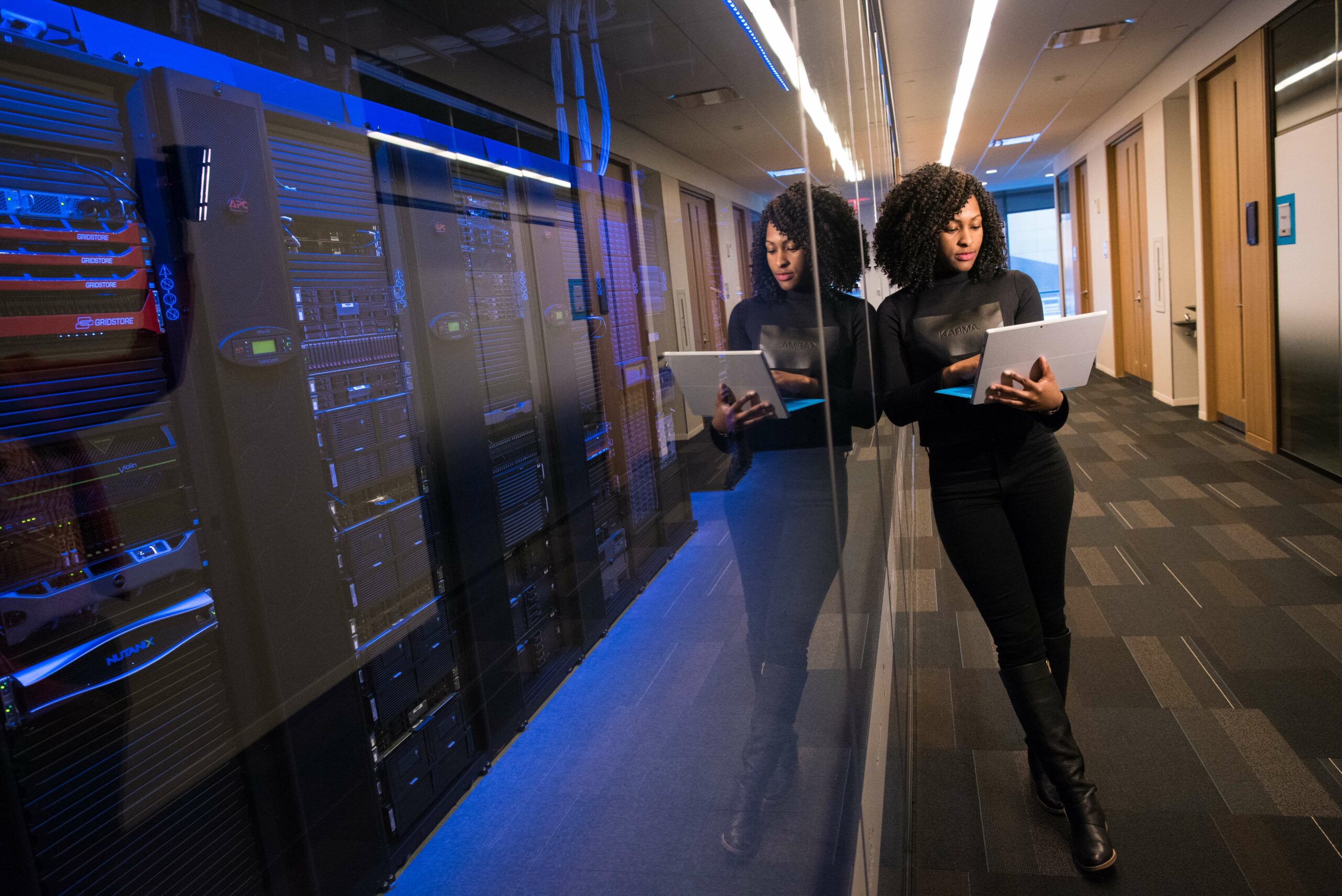 Women standing by servers